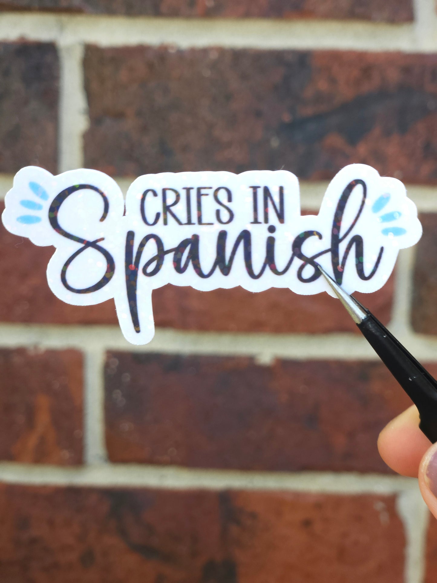Cries in Spanish Sticker